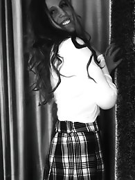 A passionate woman in her prime strips her revealing dress.